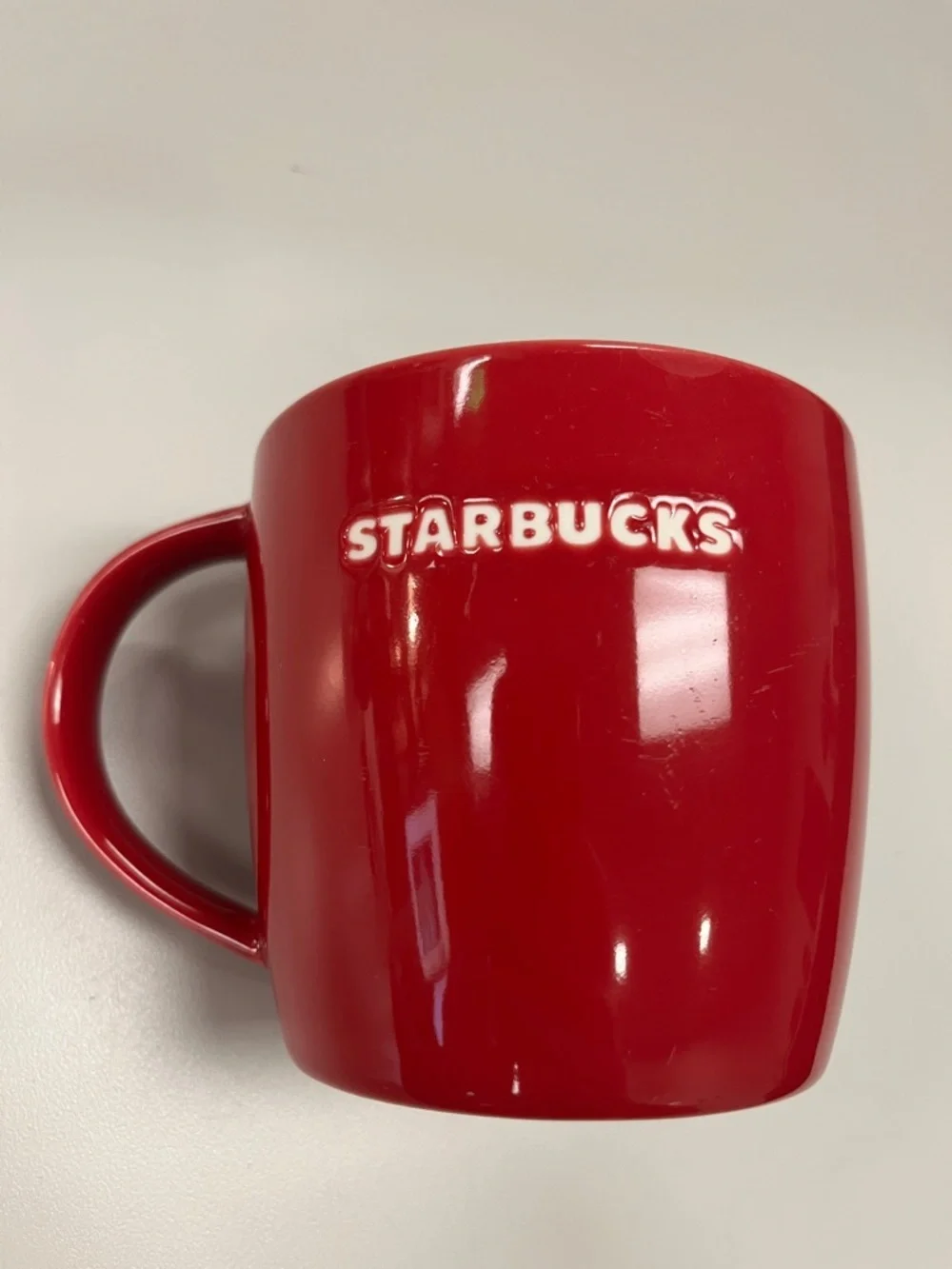 Starbucks 2011 Red Ceramic Mug with White Bird Graphic